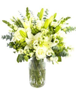 TO INCLUDE: White LA Lilies, Eustoma, Roses and Snapdragons with zesty Alchemilla Mollis and Salal.